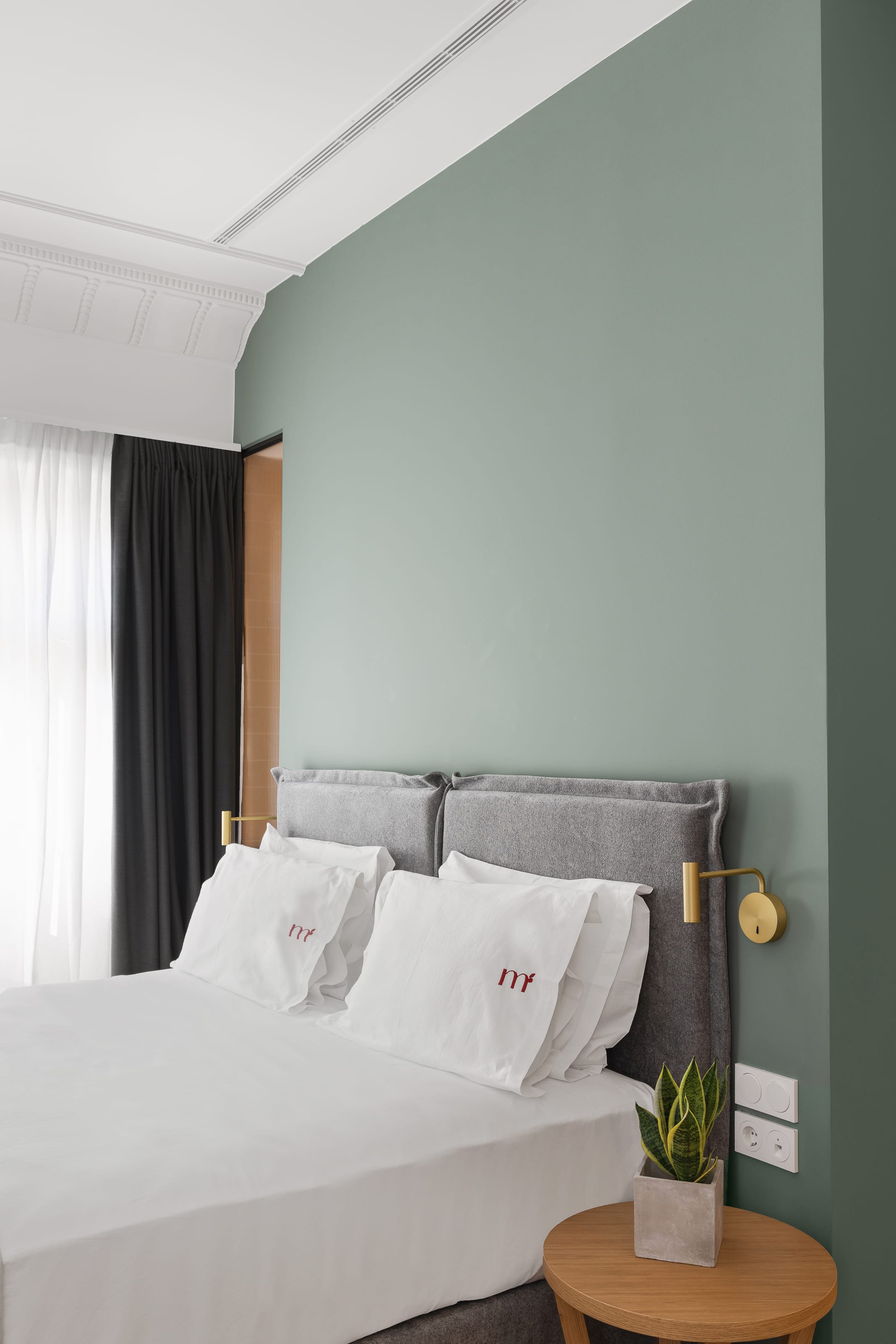 a bed with white sheets