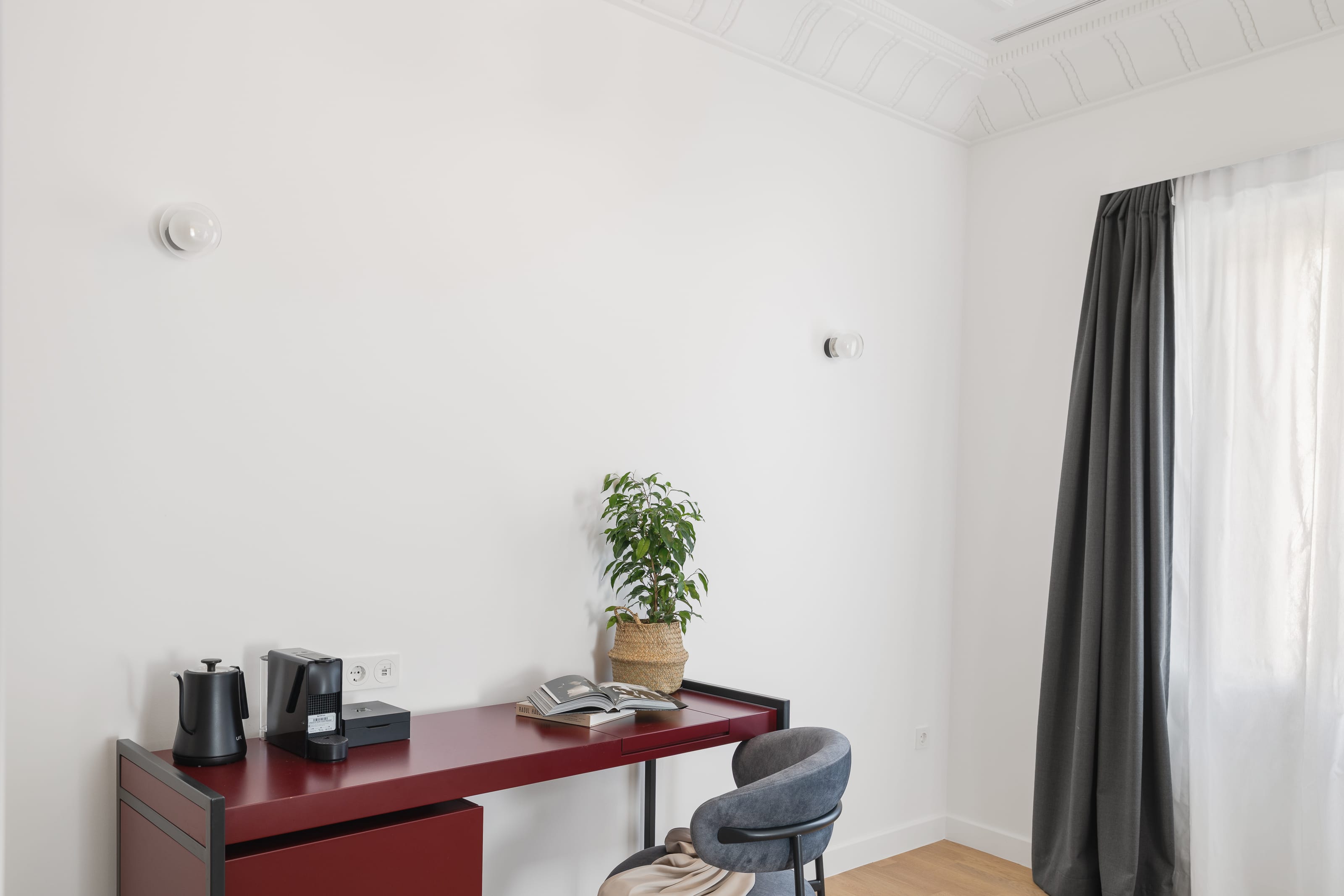 a desk with a plant on it
