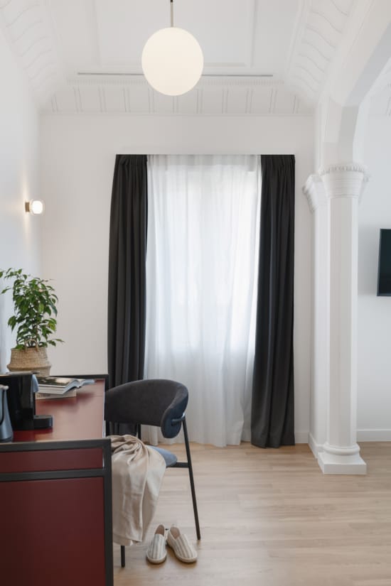 a room with a desk and a chair