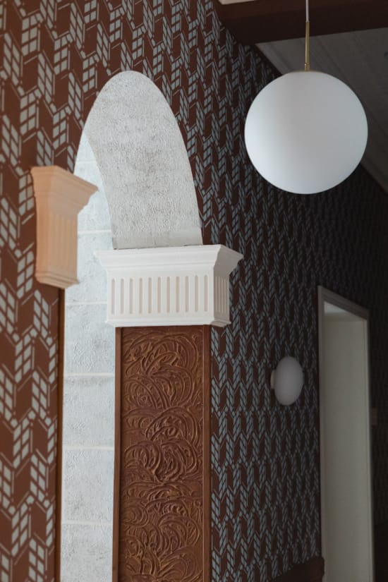 a white lamp from a wall