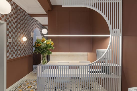 a bathroom with a tub and flowers