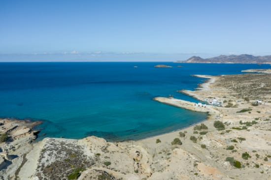 a beach with blue water