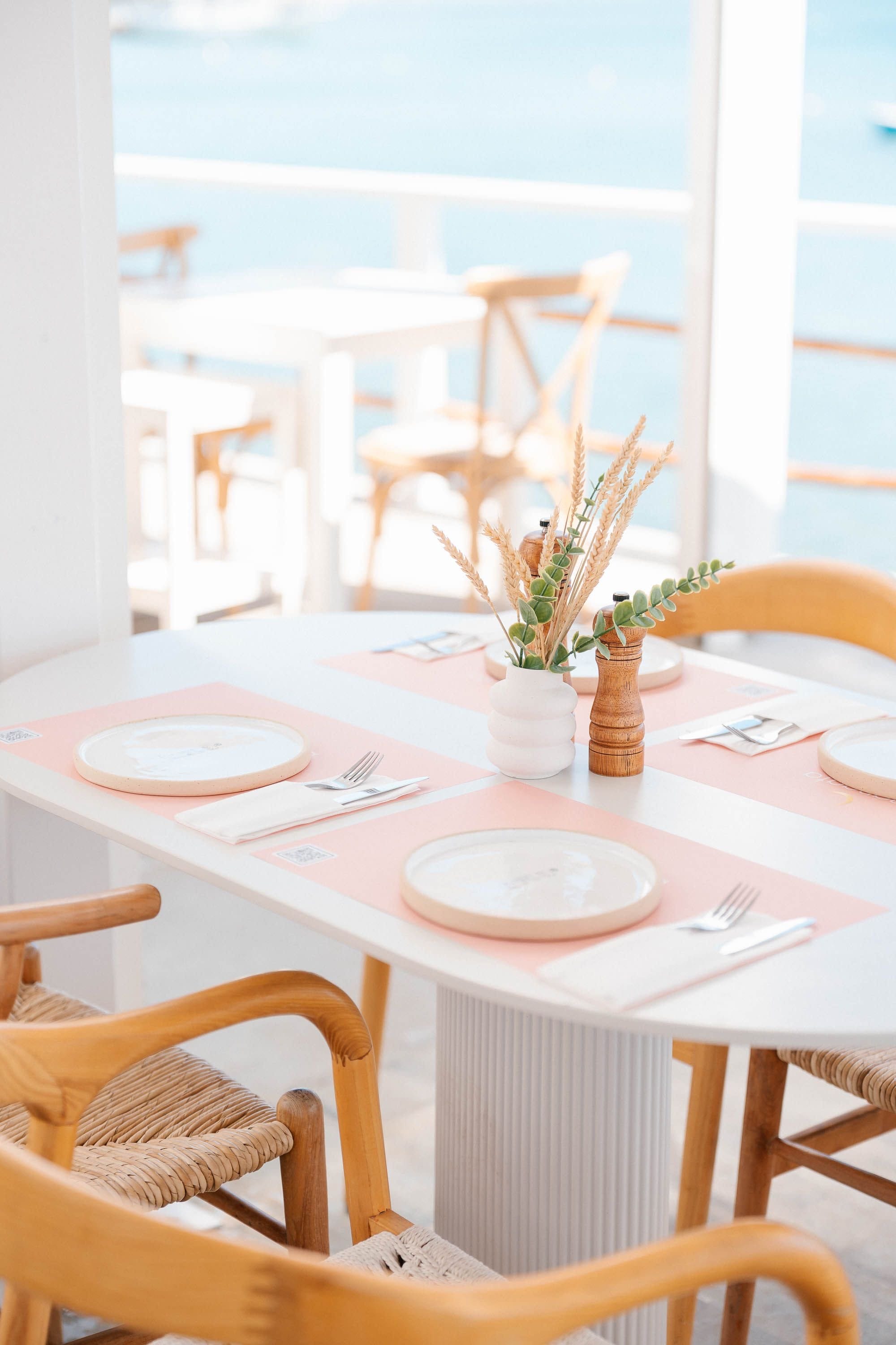 a table with plates and cutlery