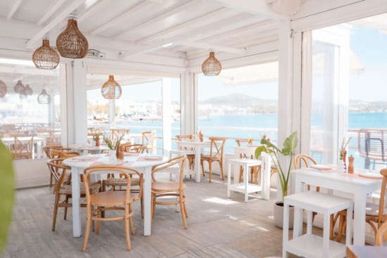 a room with tables and chairs
