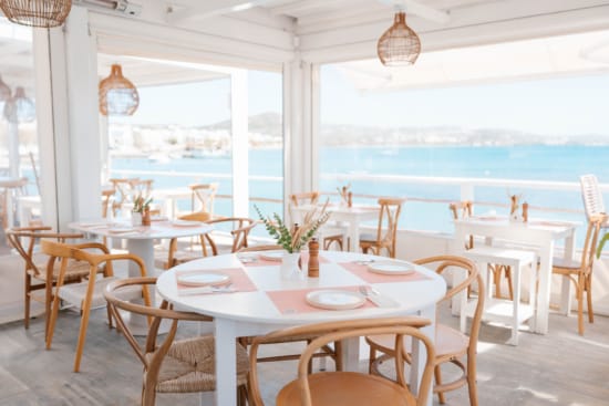a room with tables and chairs