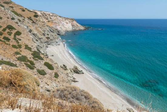 a beach with sand and water