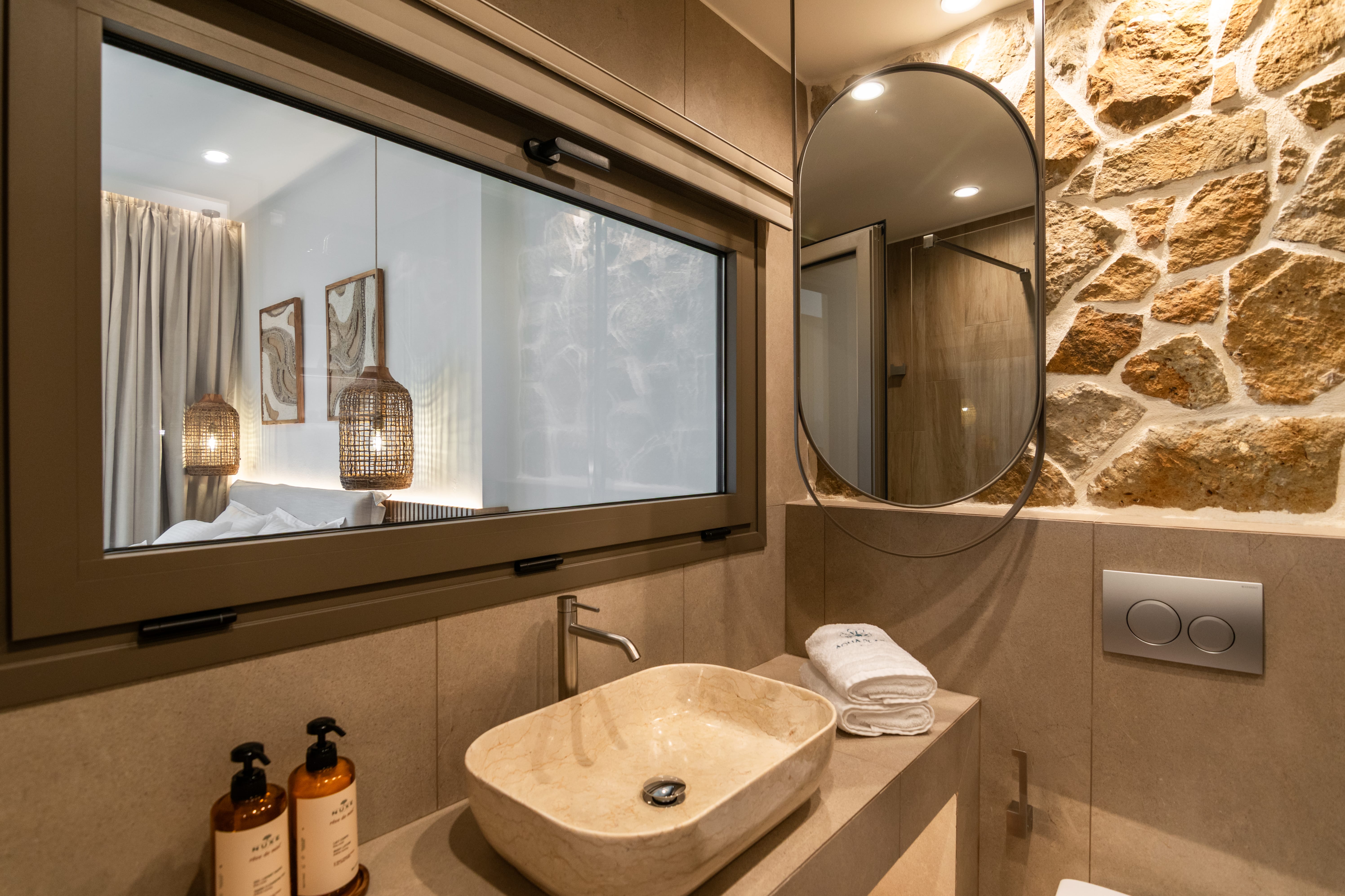 a bathroom with a large mirror