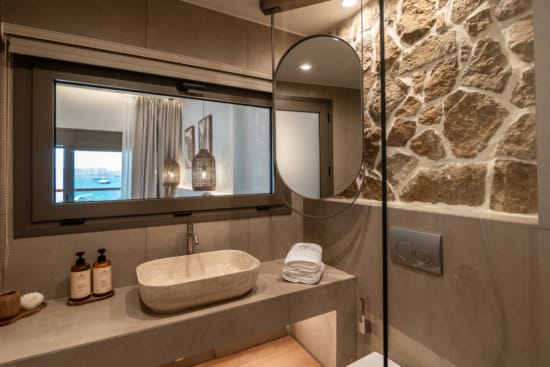 a bathroom with a large mirror