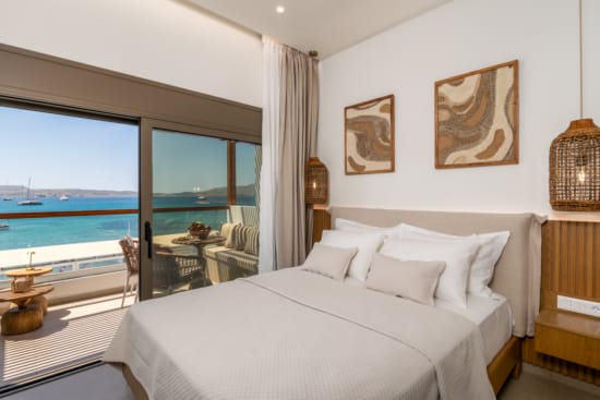 a bedroom with a large window