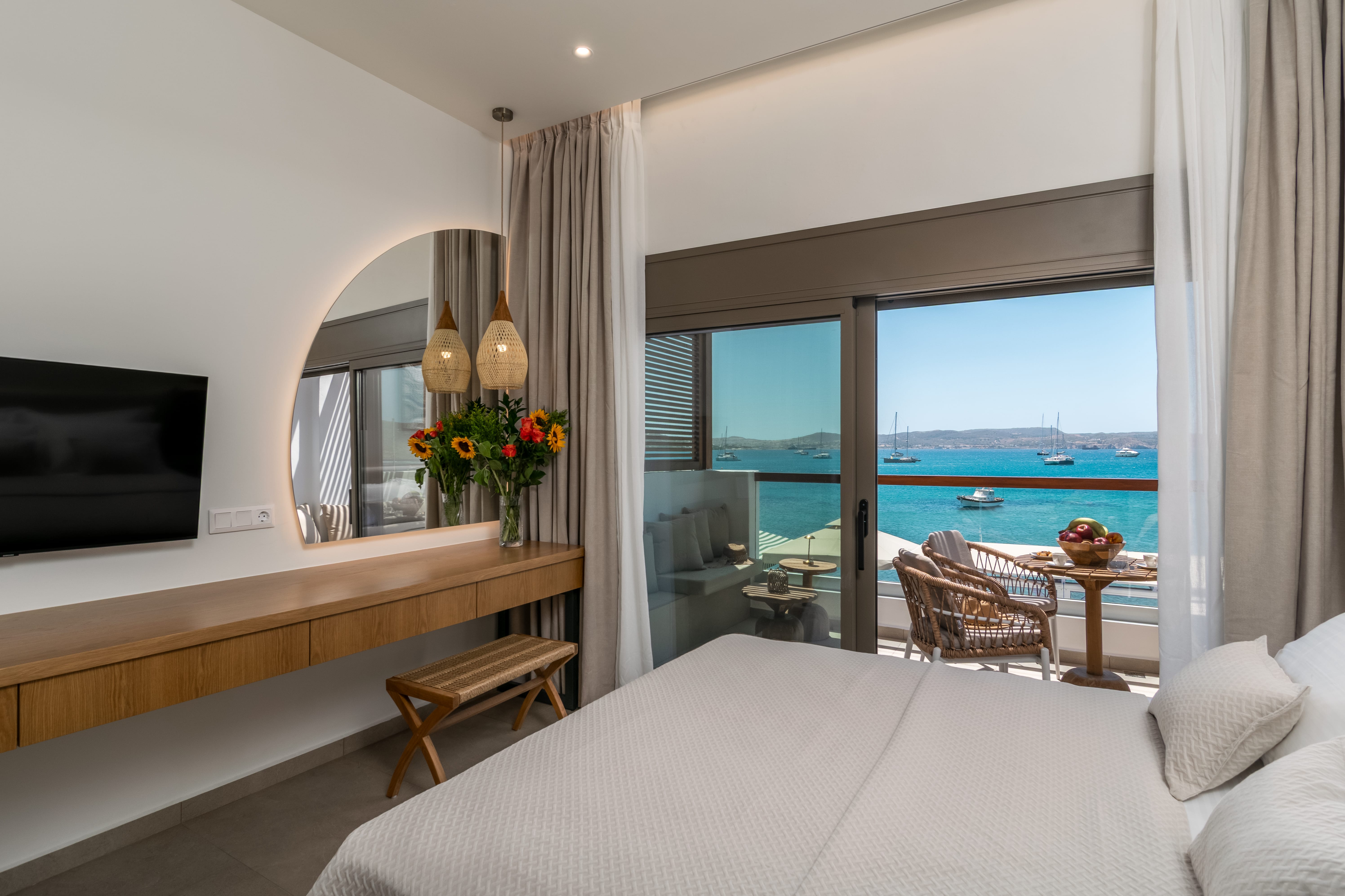 a bedroom with a large window
