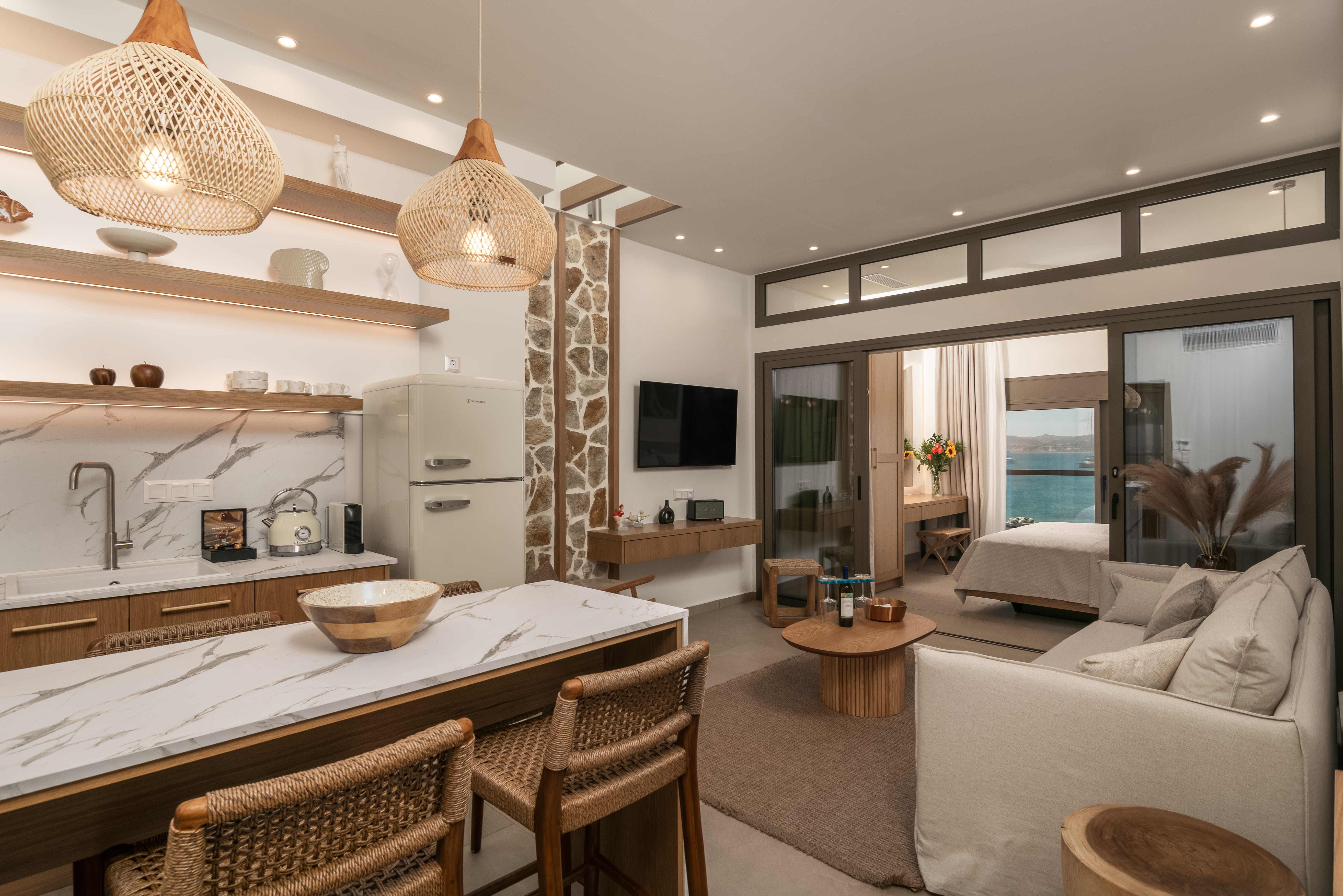 a living room with a large table and chairs