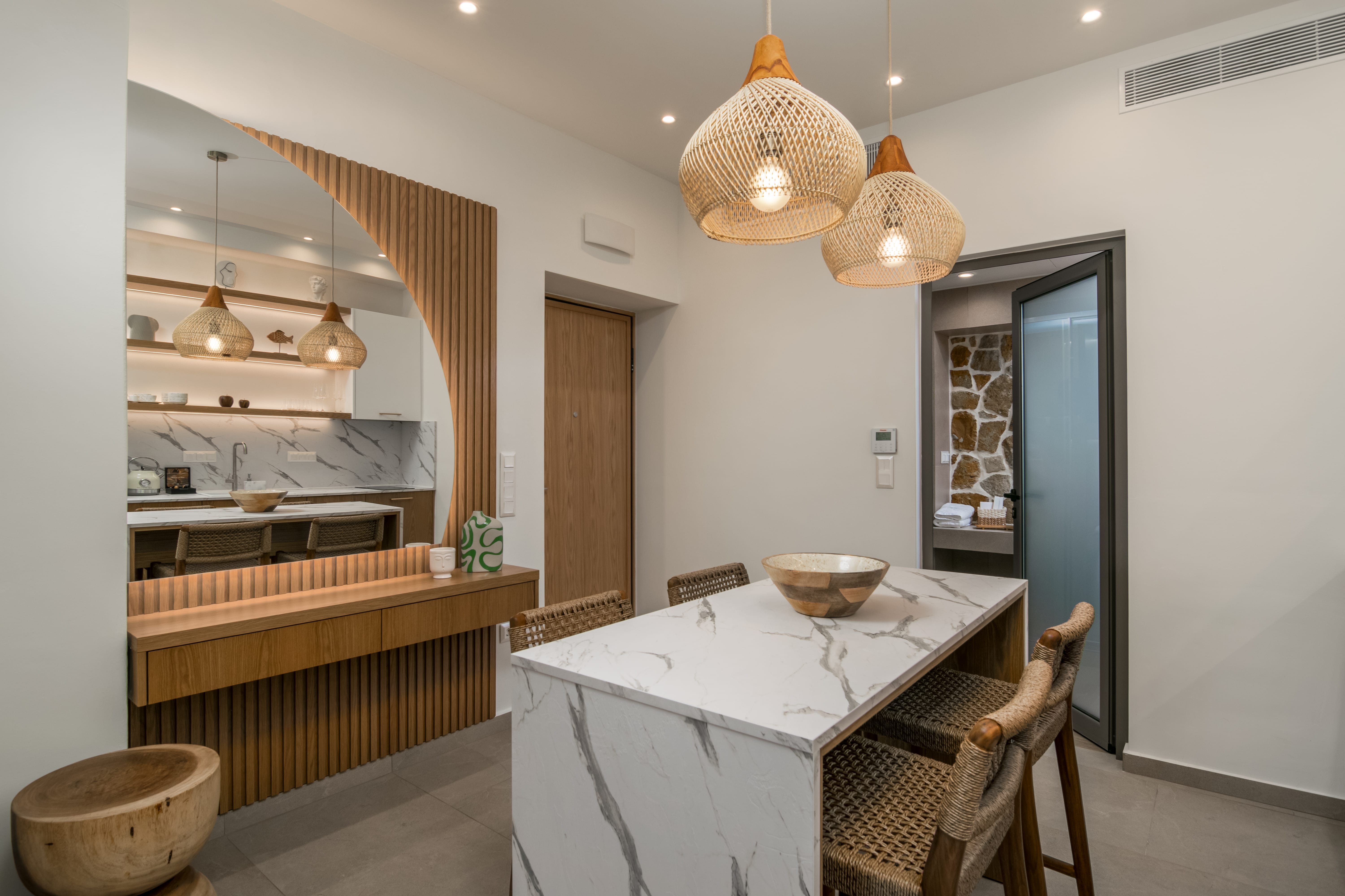 a kitchen with a table and chairs
