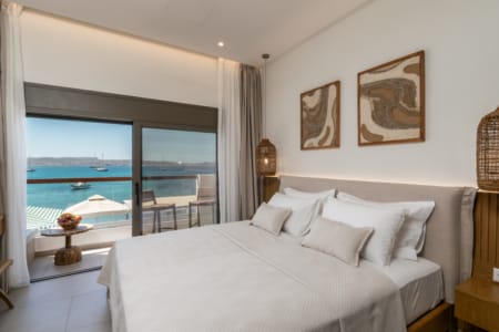 a bedroom with a large window