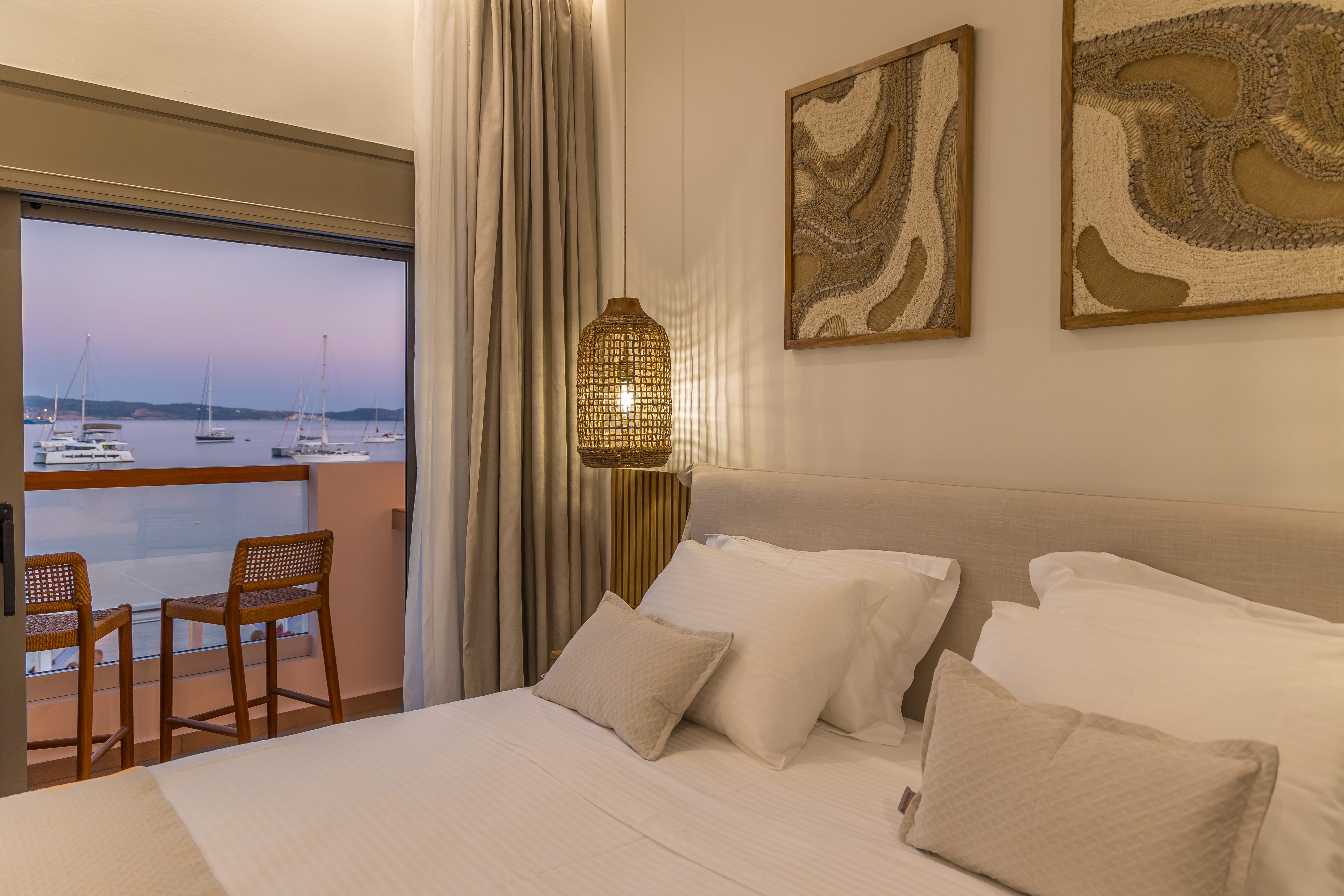 a hotel room with a large window