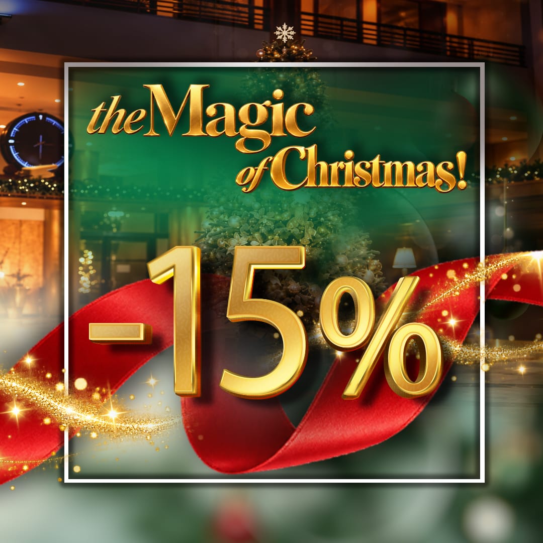 a christmas sale sign with a red ribbon