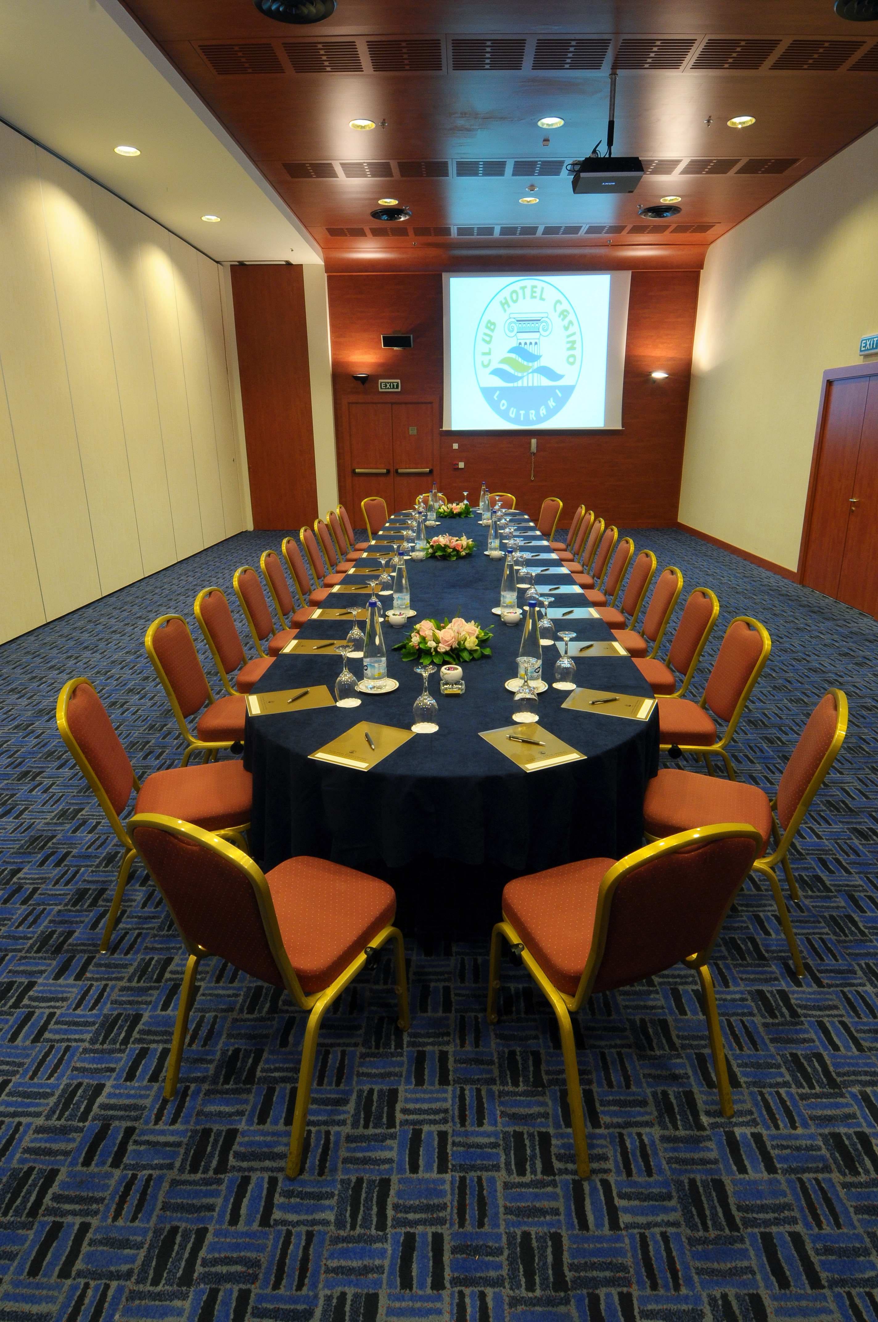 a room with a table and chairs