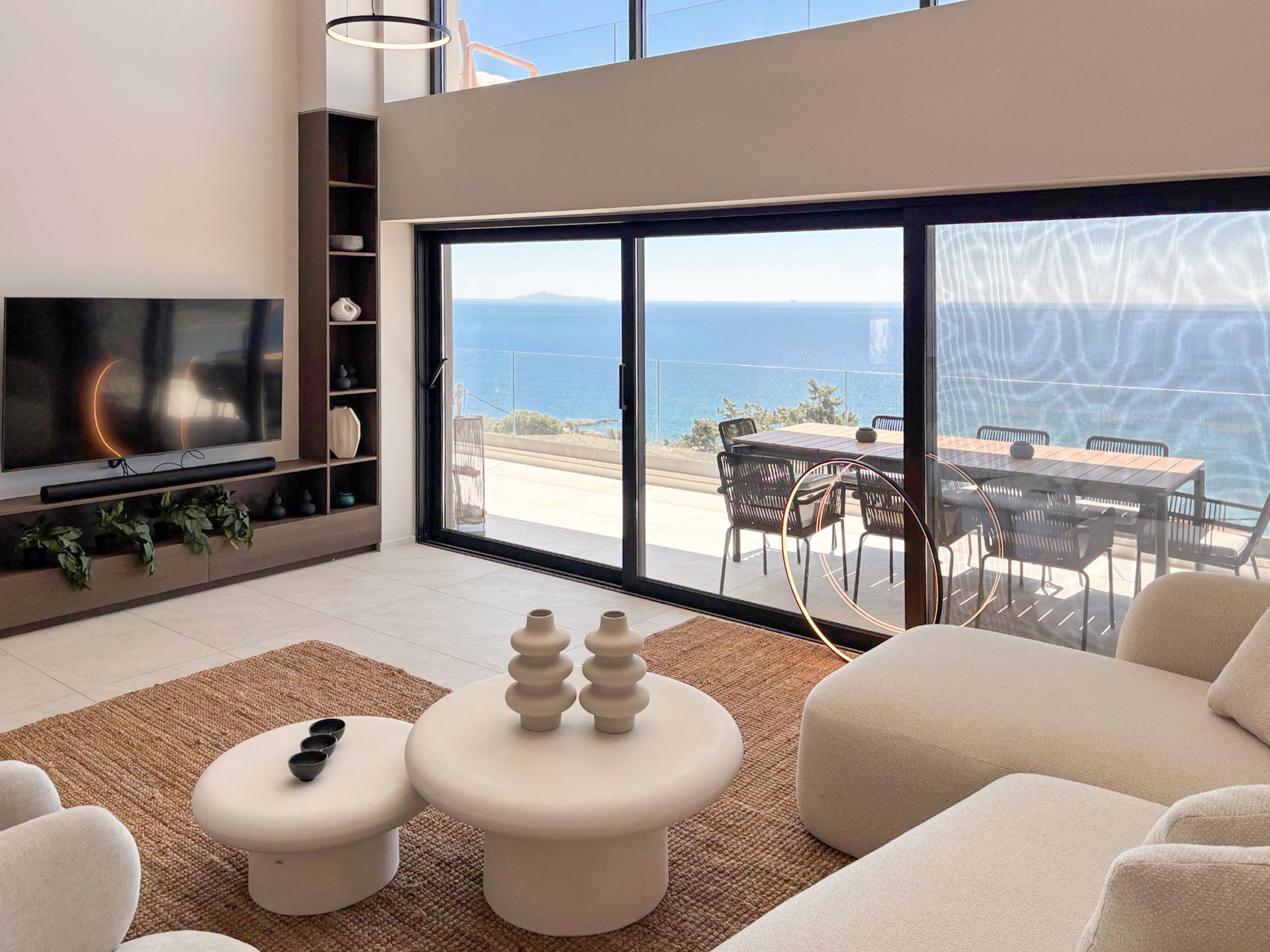 a living room with a tv and a table