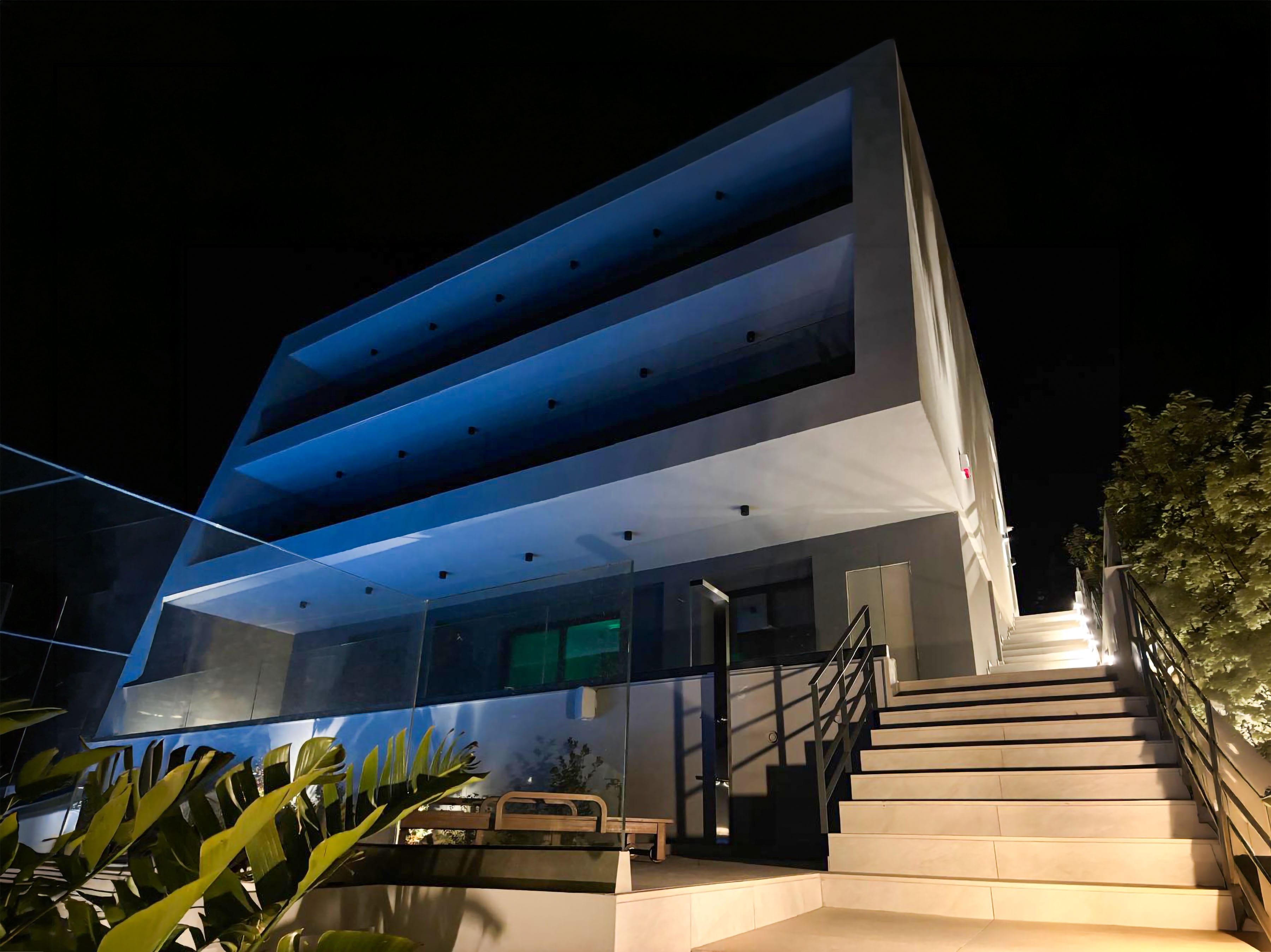 a house with a pool and stairs