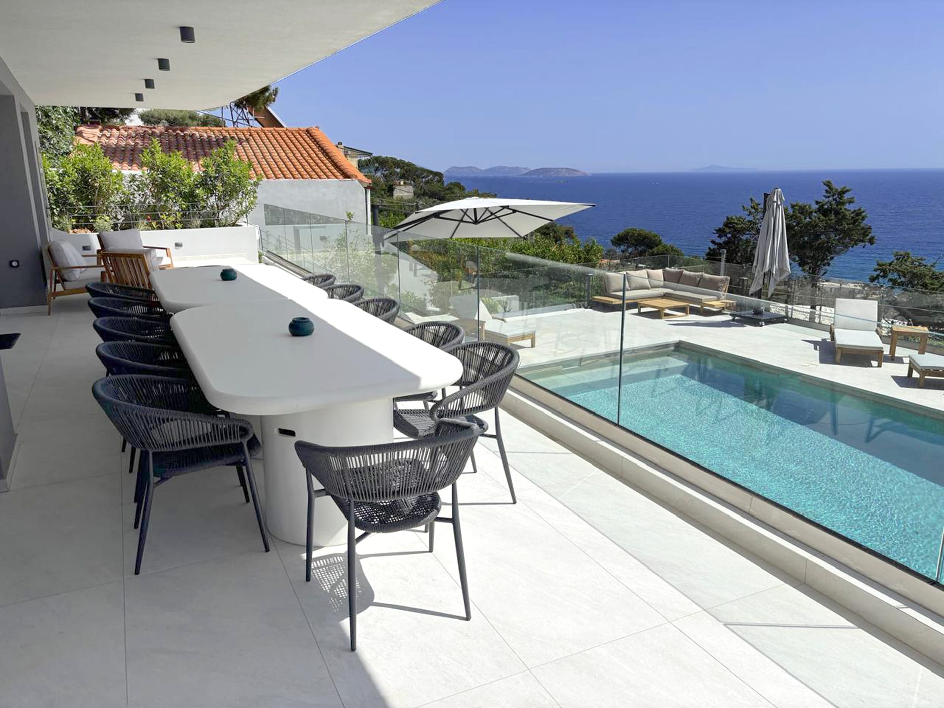 a pool with a table and chairs