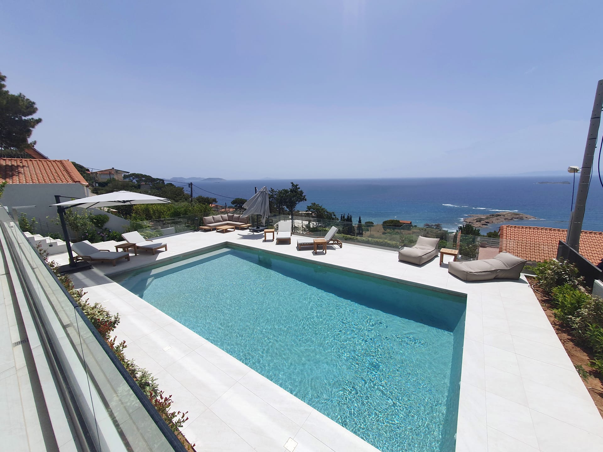 a swimming pool with a view of the ocean