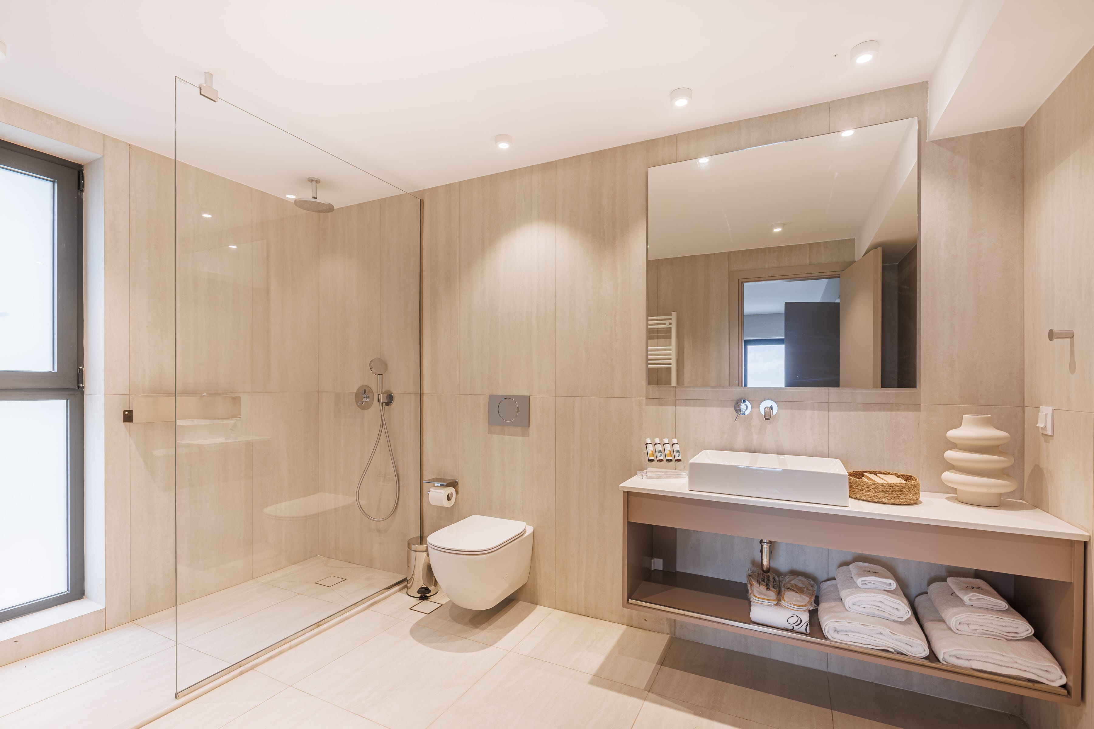 a bathroom with a glass shower
