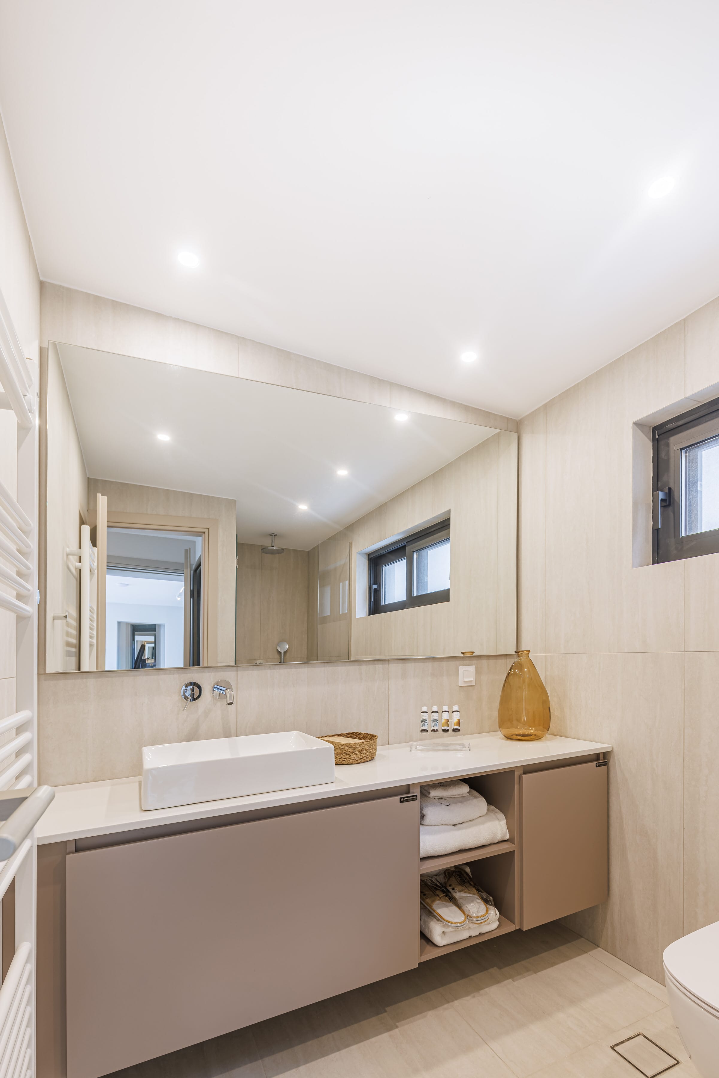 a bathroom with a large mirror