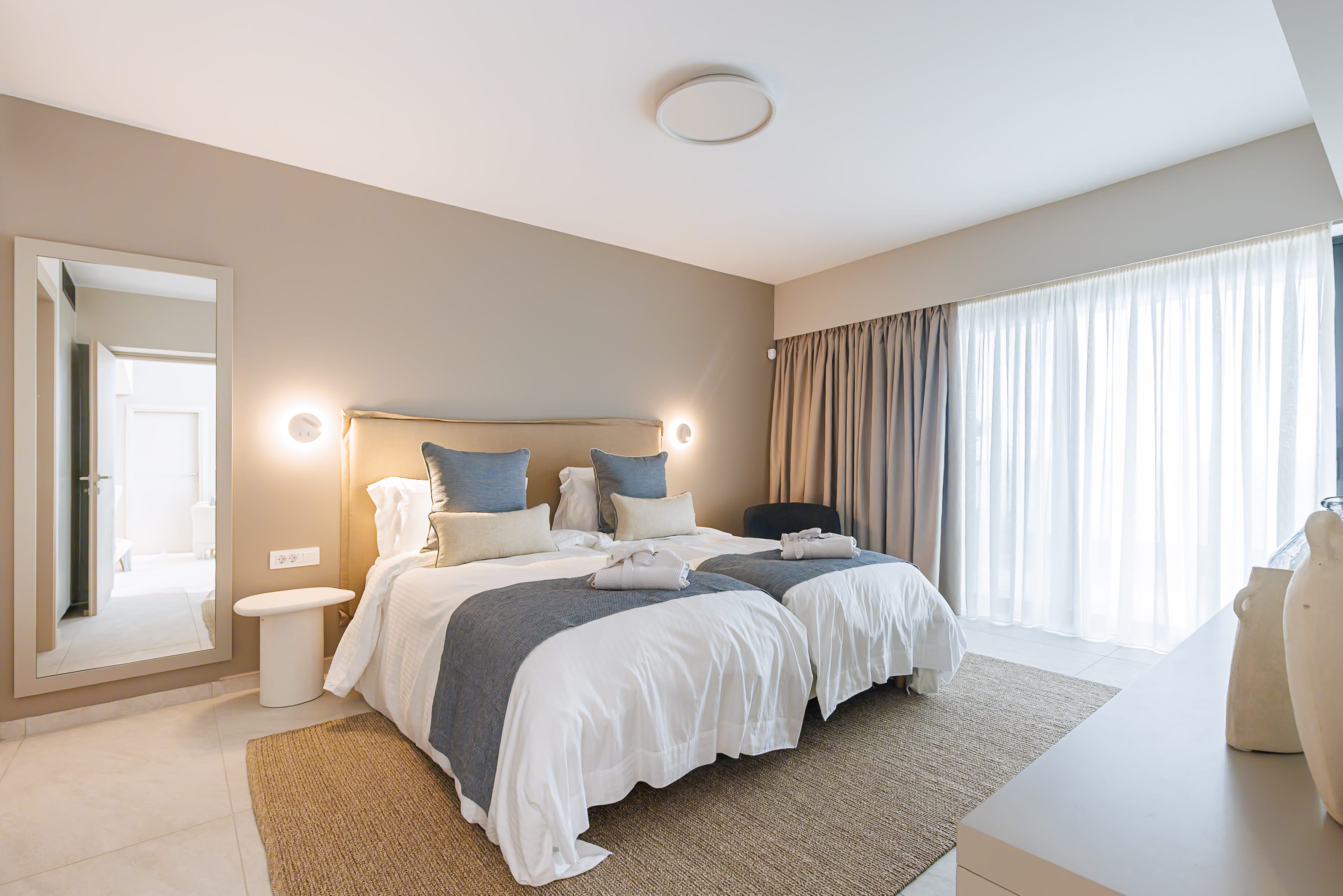a hotel room with two beds