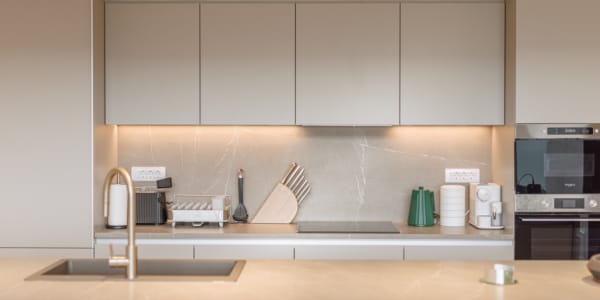 a kitchen with white cabinets