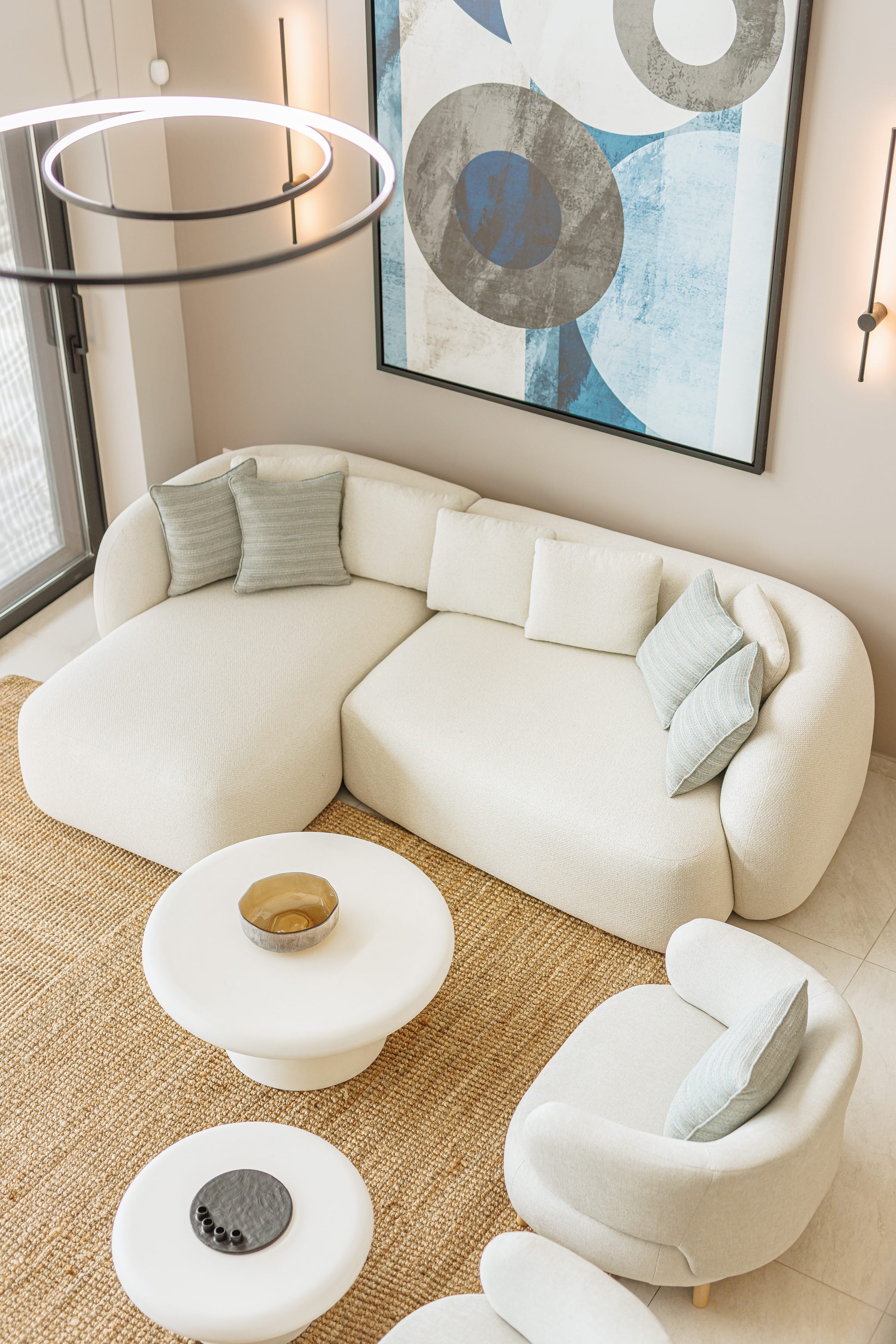 a room with a couch and a mirror