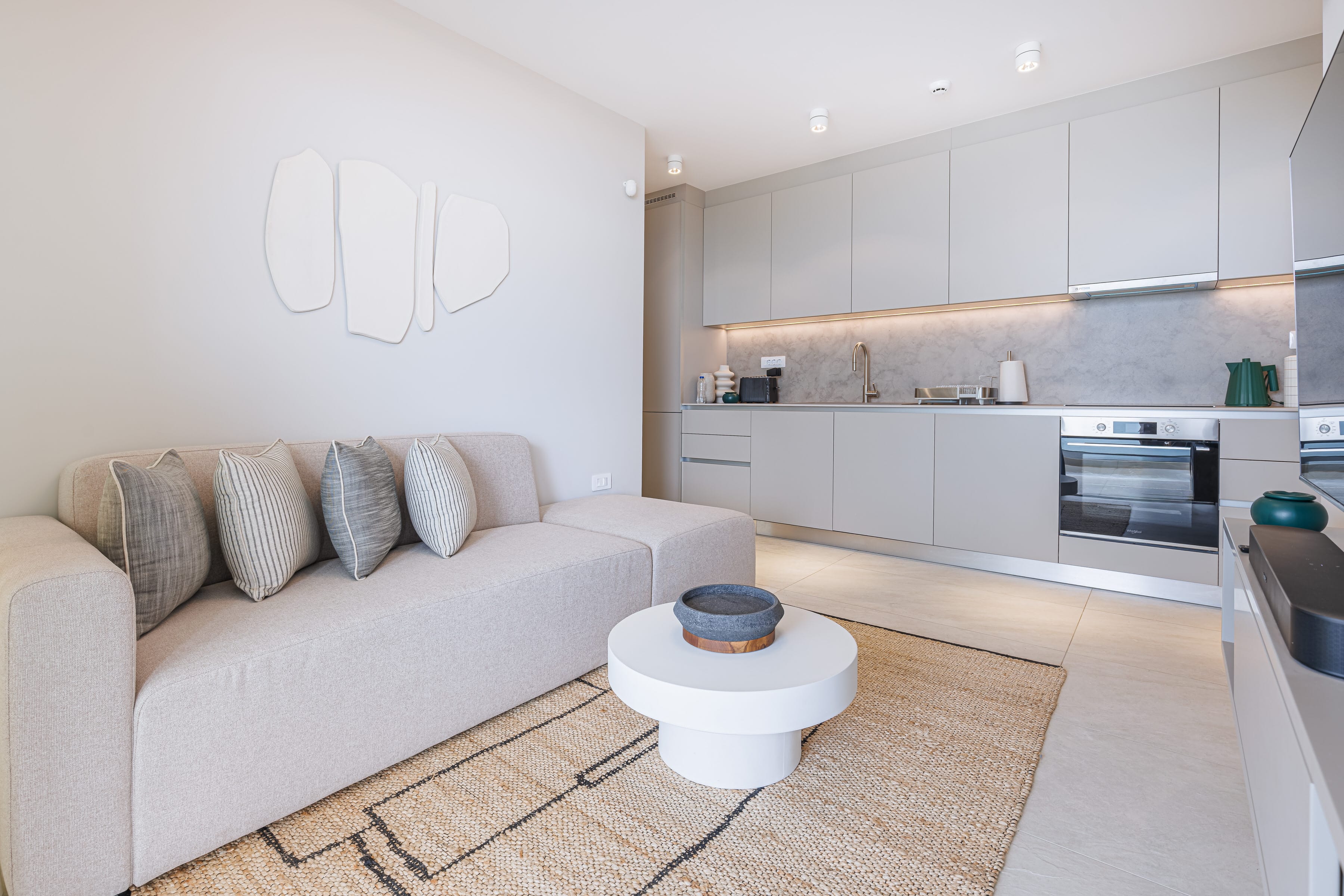 a living room with a couch and a table