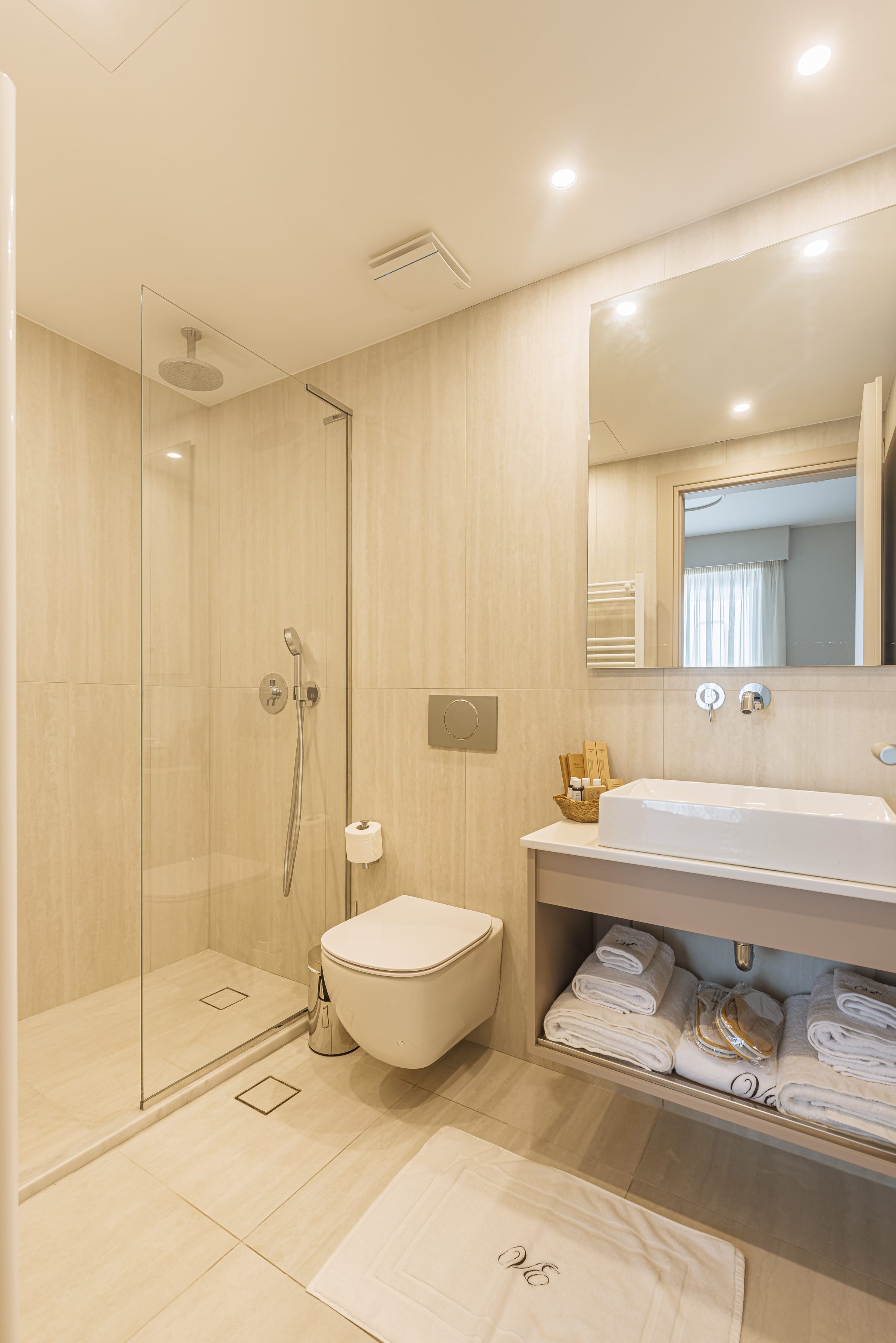 a bathroom with a glass shower