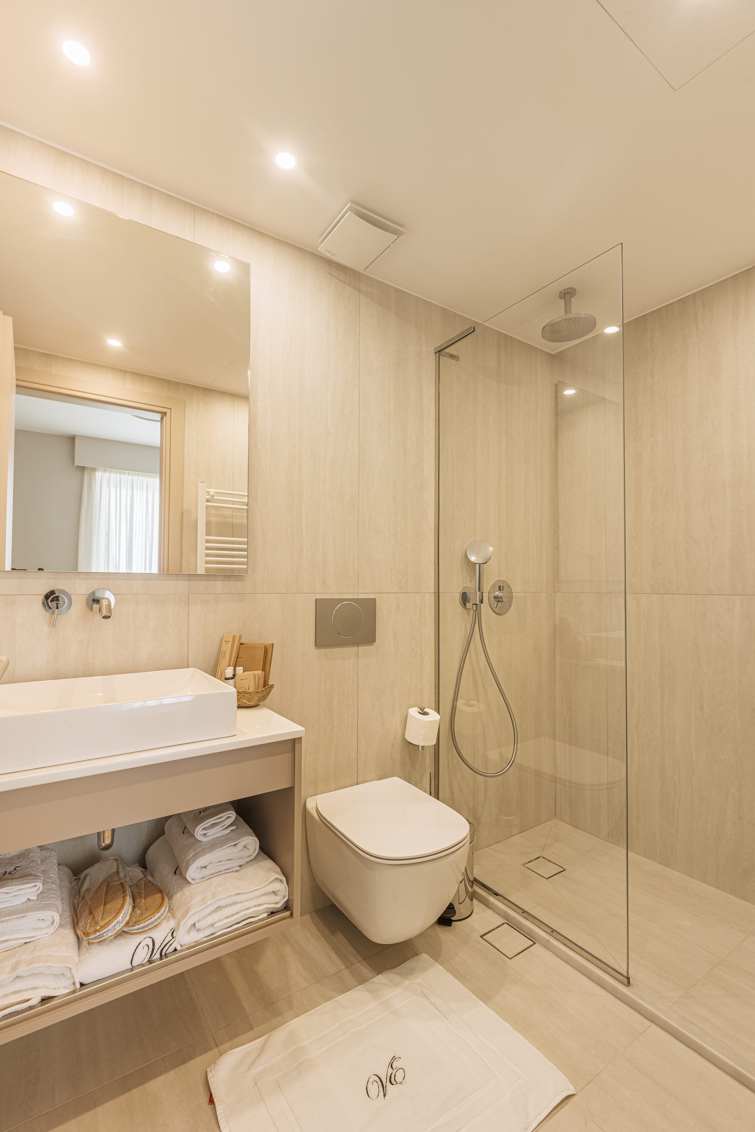 a bathroom with a glass shower