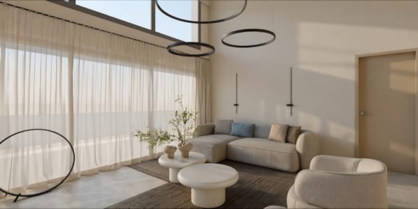 a room with a couch and chairs