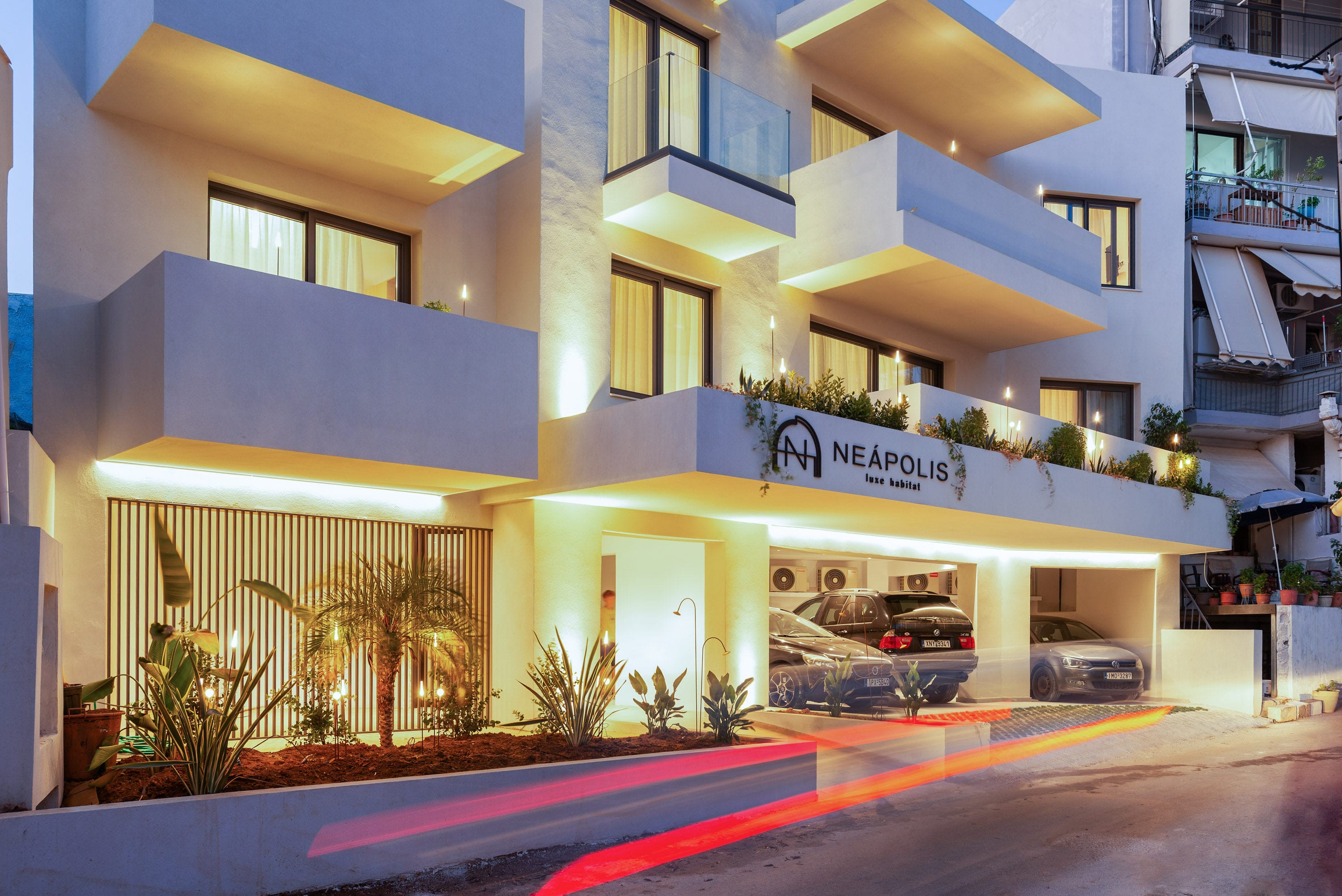 a building with a street and cars