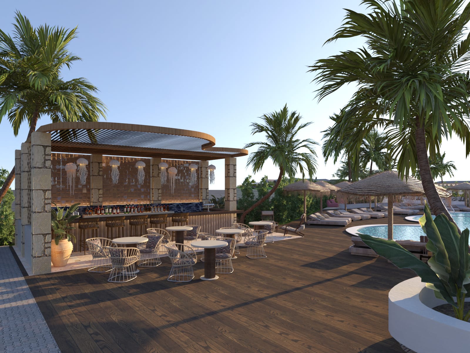 a patio with tables and chairs and umbrellas by the water