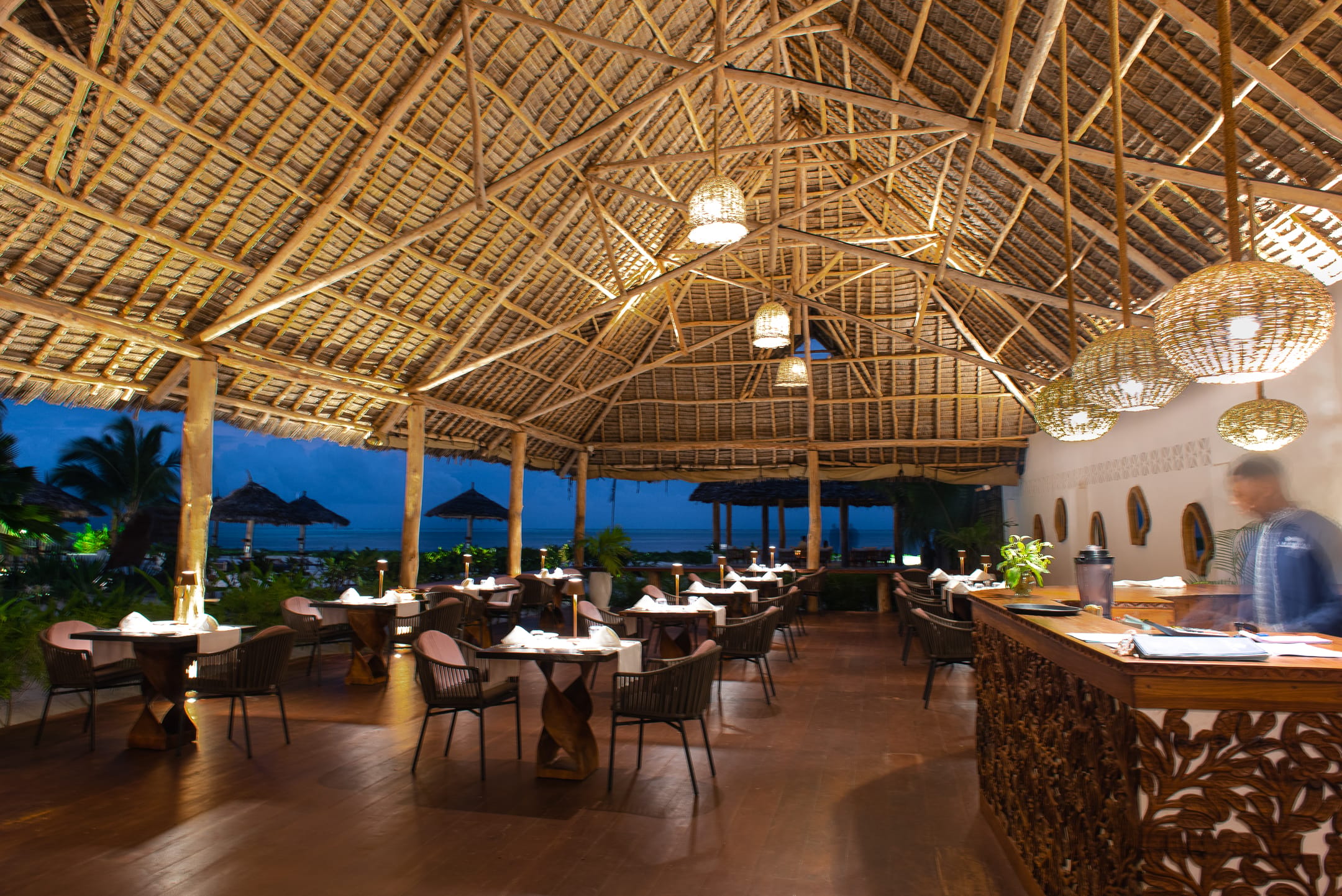 a restaurant with tables and chairs