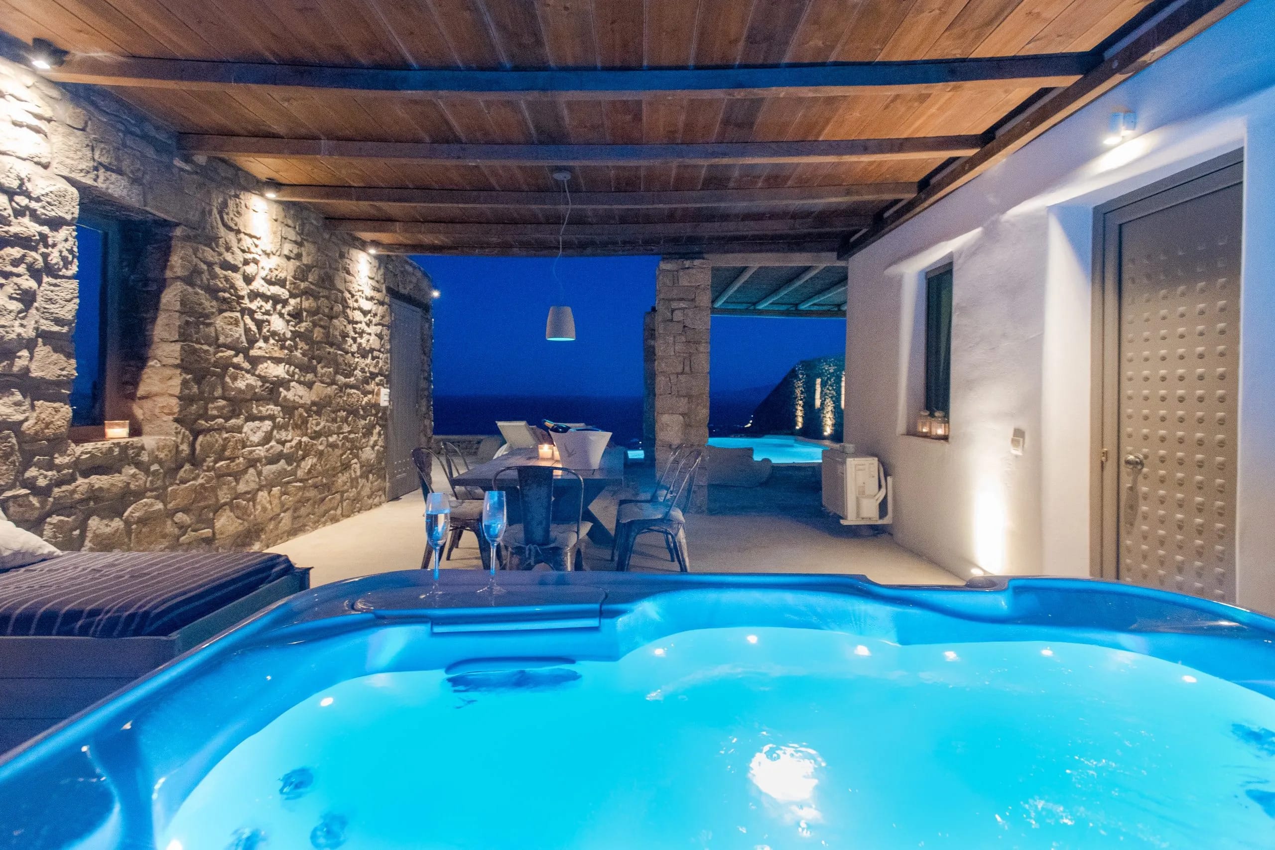 a pool with a table and chairs