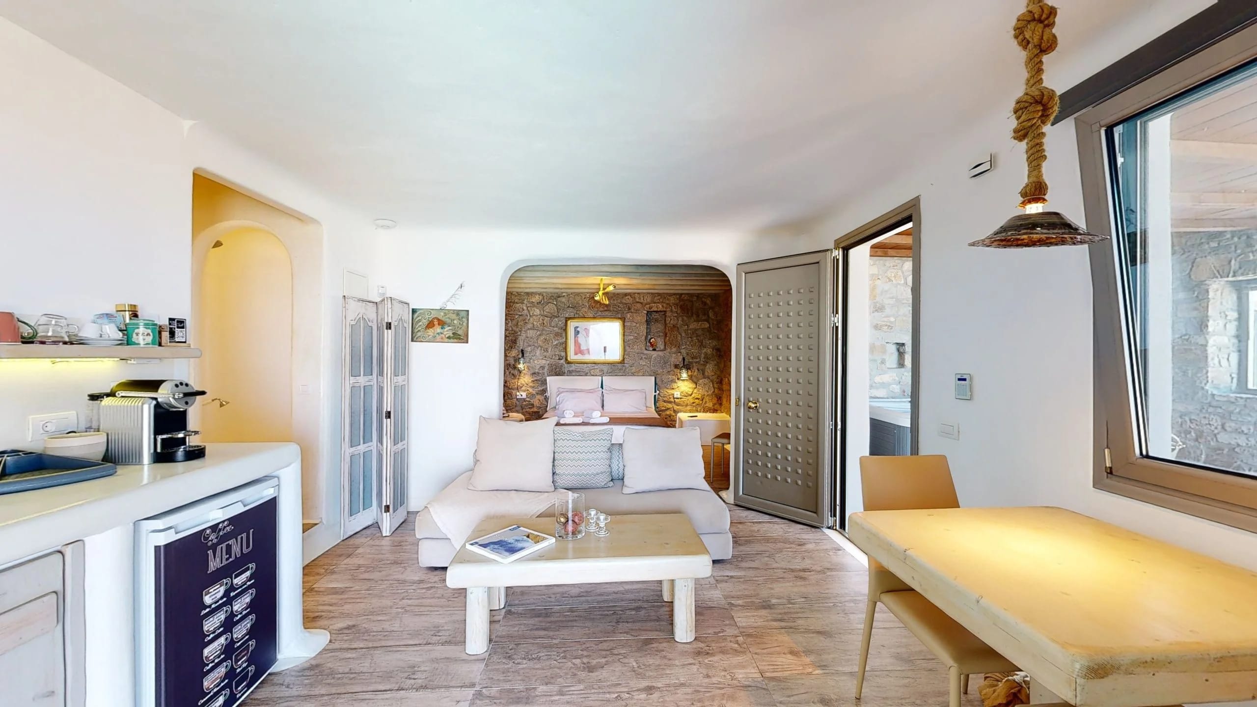 a living room with a couch and a table