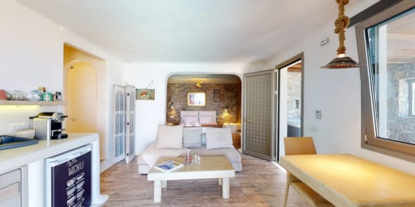 a living room with a couch and a table