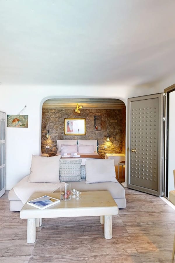 a living room with a couch and a table