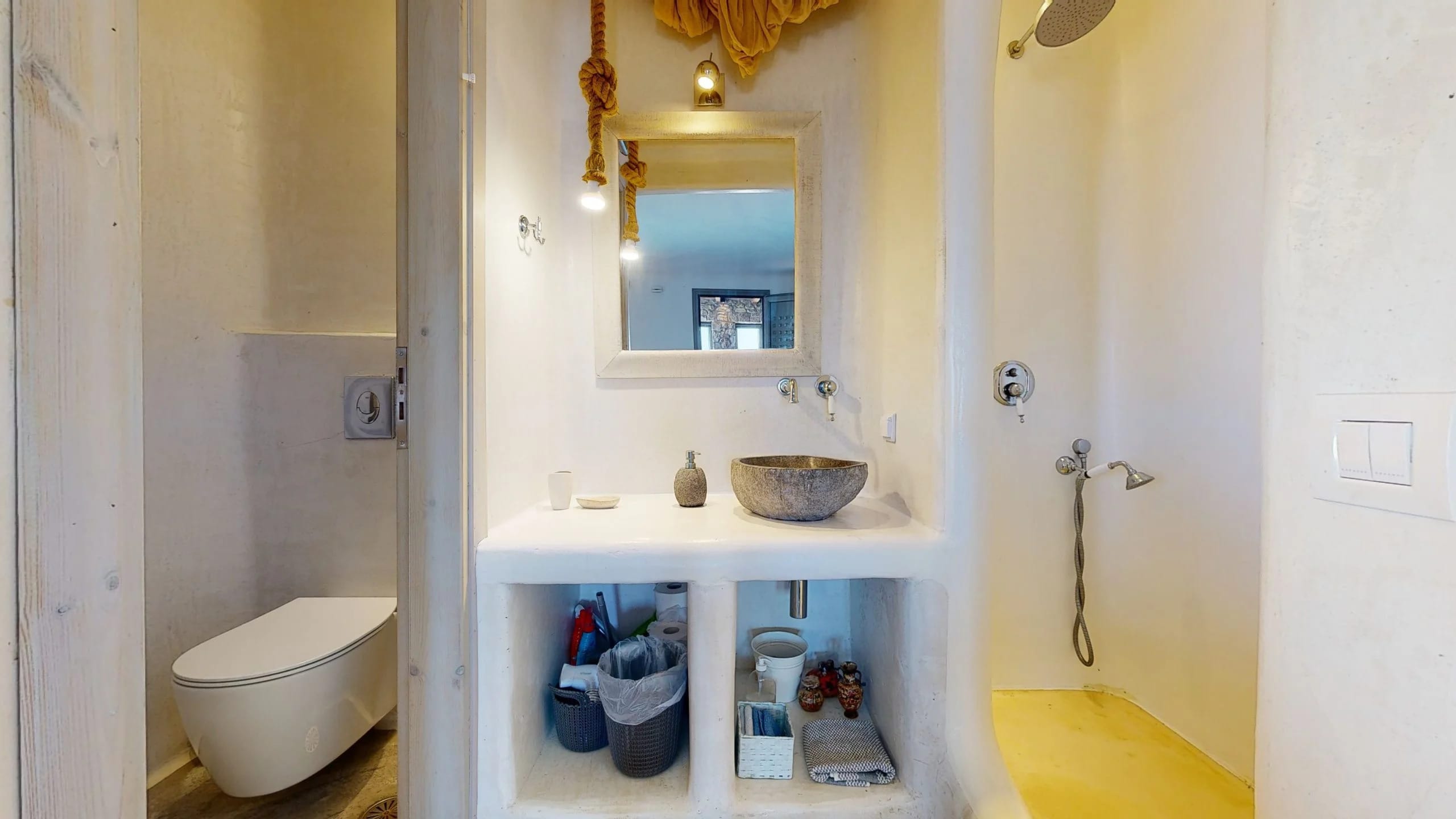 a bathroom with a sink and toilet