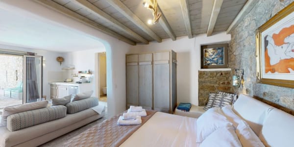 a bedroom with a fireplace