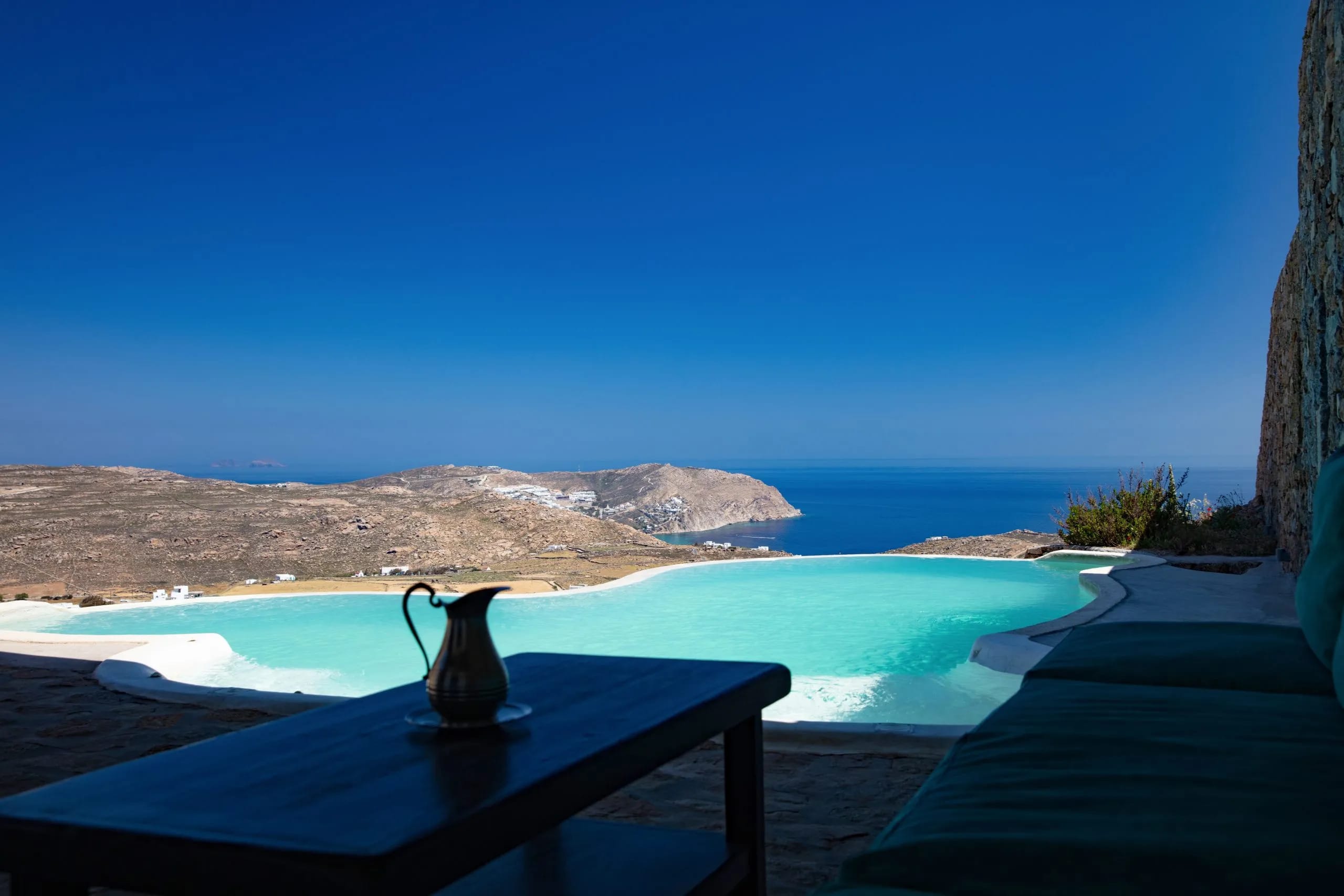 a pool with a bird on a table