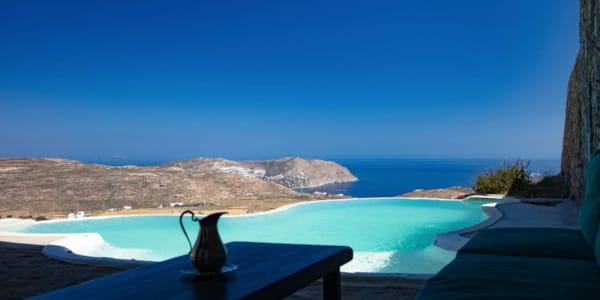 a pool with a bird on a table