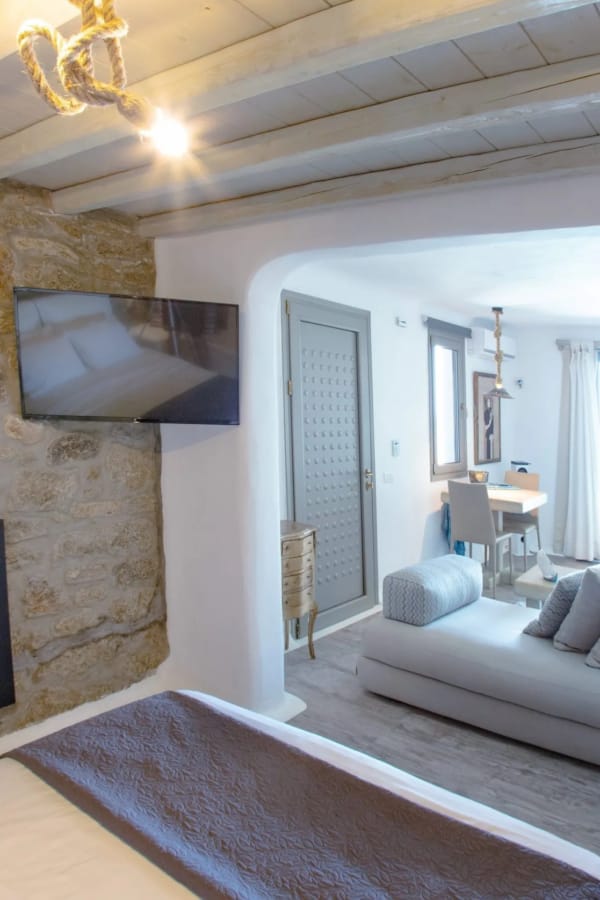 a bedroom with a large mirror