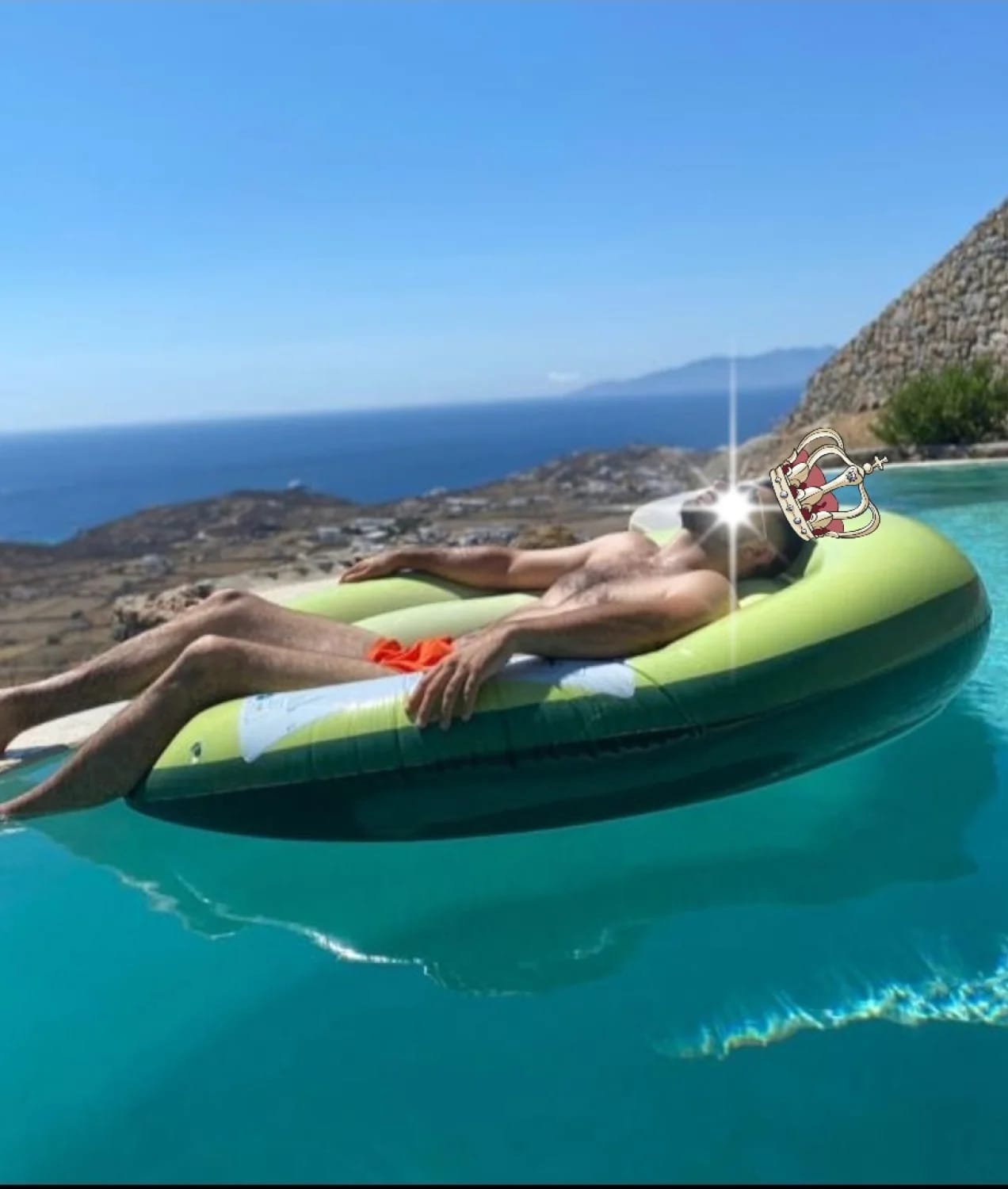 a person floating in a floating raft