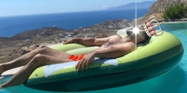 a person floating in a floating raft