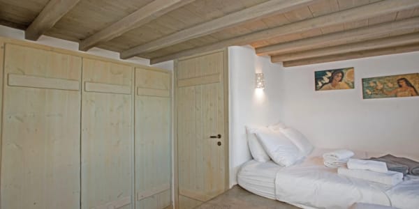 a room with a bed and a door