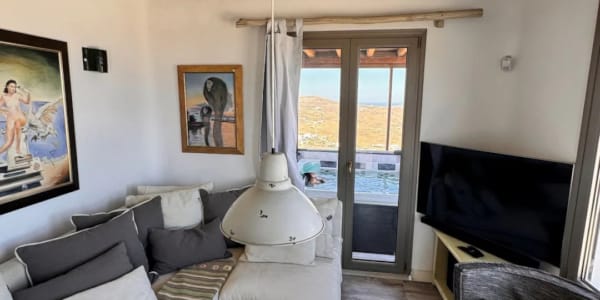 a living room with a couch and a table