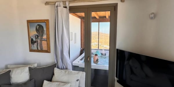 a living room with a couch and a tv